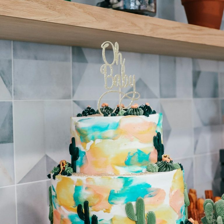 Oh Baby Tiered cake Tiered Baby shower cake with pastel colours